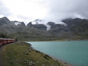 The glacier and silty-blue lake at the top of the Bernina pass.