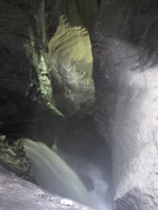 TrÃ¼mmelbach Falls, where the rush of water is cutting away at the rocks