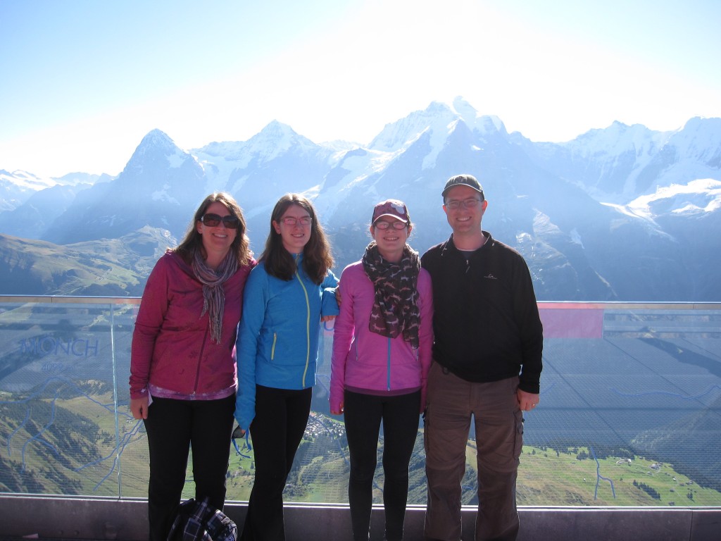 A bright and sunny morning at the Birg viewpoint on the way to the Schilthorn. The mountains in the background are three famous peaks in this region of Switzerland: the Eiger, the MÃ¶nch, and the Jungfrau.